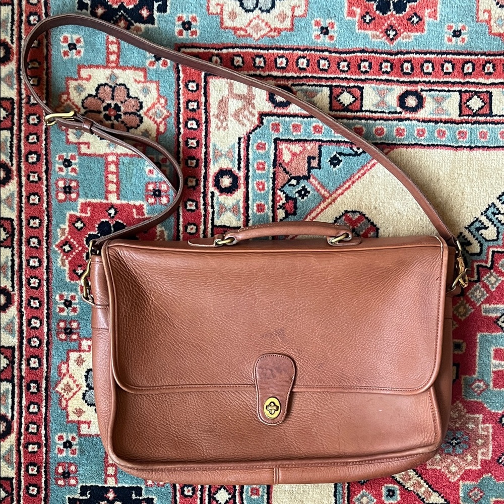 Vintage coach briefcase. Brown leather, simple design. Minor discoloration.